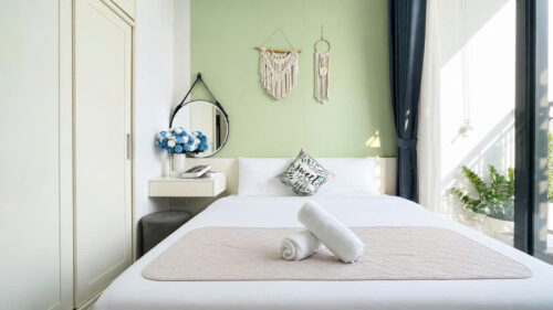 Phòng ngủ homestay Green Bay G3 tầng 29 tông xanh pastel